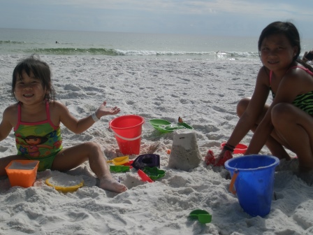 Kasen and Karis playing in the sand